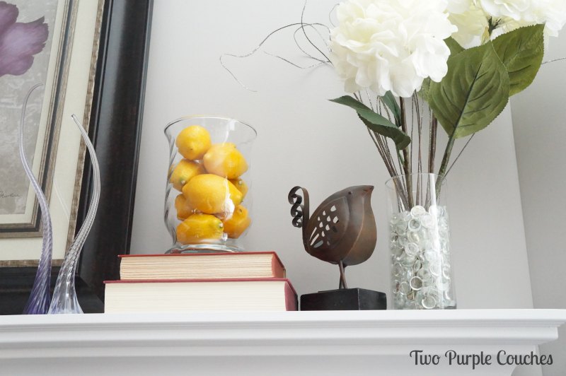 Springy mantel with pops of yellow - Two Purple Couches