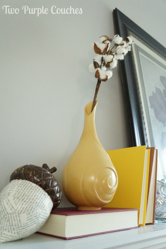 Beautiful saffron yellow Rookwood Pottery fluted vase mixed with neutrals for a mod take on Fall decor. via www.twopurplecouches.com #fall #falldecor #mantels #homedecor