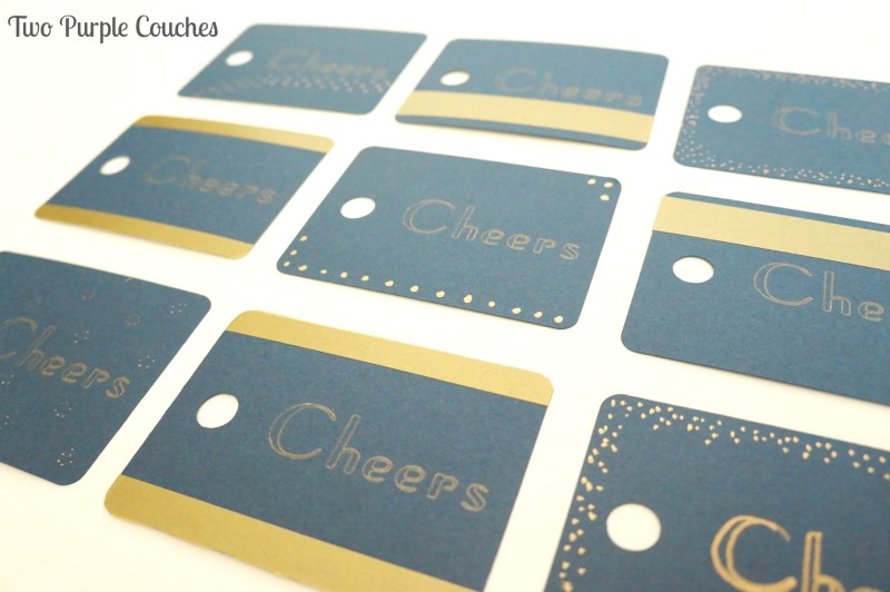 Love these navy & gold "Cheers" gift tags. Great for housewarming gifts, weddings, showers and more! via www.twopurplecouches.com