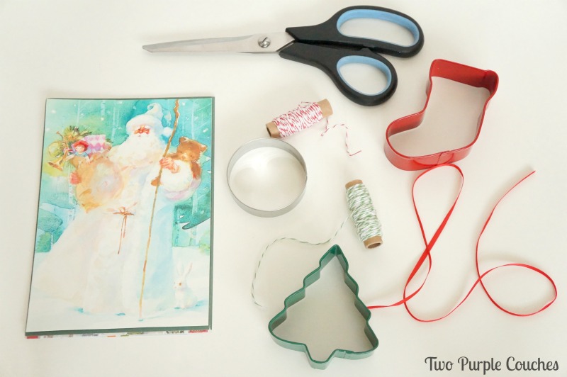 Make your own gift tags using last year's holiday cards, ribbon, and cookie cutters. via www.twopurplecouches.com