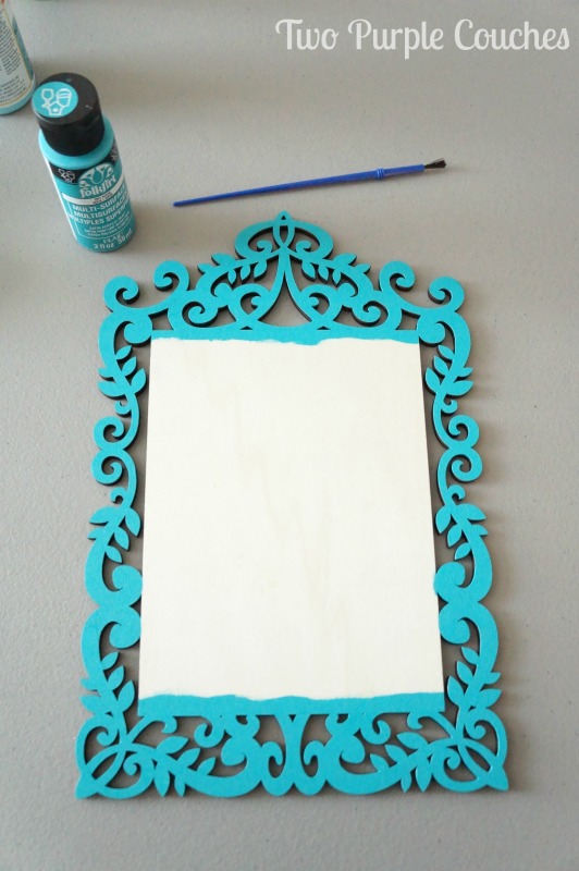 Paint wood surfaces to create unique photo holders and frames.  via www.twopurplecouches.com