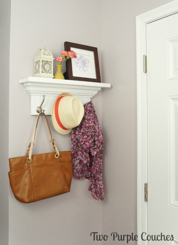 Love this simple wall shelf! She includes easy instructions so you can make your own wall shelf with hooks. Perfect storage idea for a small space.