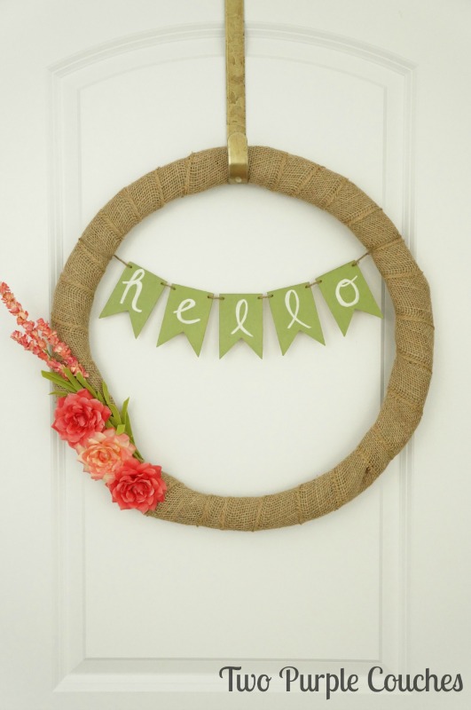 How to make a simple Spring Floral Wreath with burlap, faux flowers and a banner.