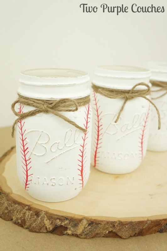 Create your own painted baseball mason jars with this easy-to-follow tutorial! These make adorable utensil caddies or vases for a baseball themed baby shower or party!