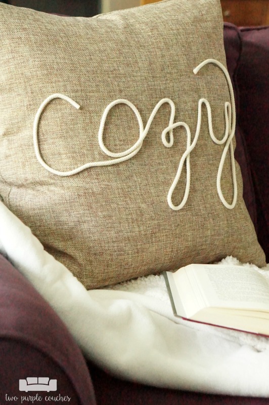 Create your own "cozy" DIY fall pillow cover with this simple no sew technique using cotton cord and hot glue! This idea is perfect for fall or winter decorating!