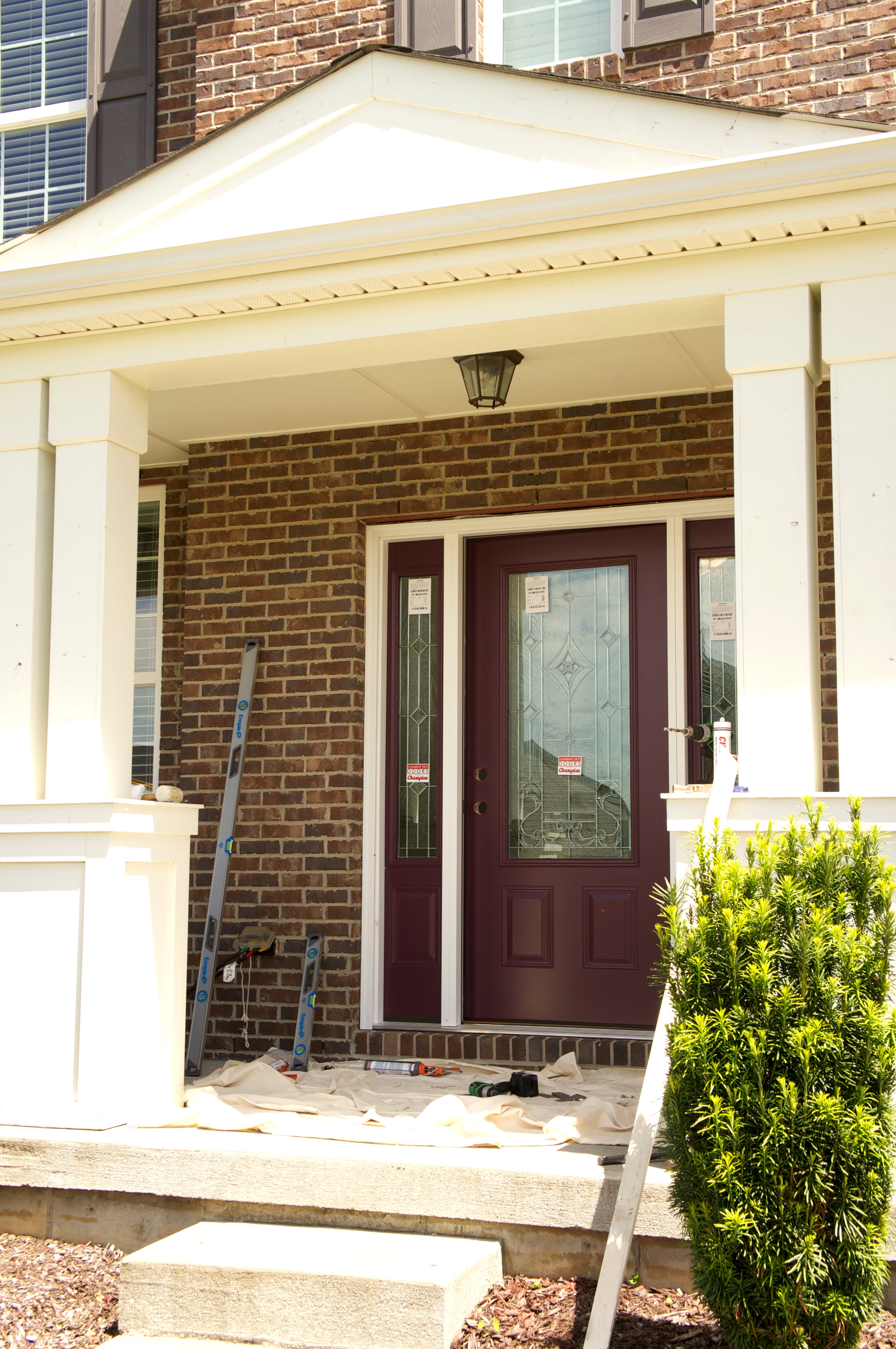 Wow! You've got to see this before and after! This new decorative glass front door adds so much style and curb appeal to this home! 