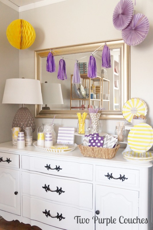 Love this bright and colorful party buffet! Plenty of purples and yellows plus a splash of gray. Styled for Celebrate by Kate in Madeira, Ohio. via www.twopurplecouches.com #celebratebykate #partytime #letsparty #purpleparty #yellowparty #partydecor
