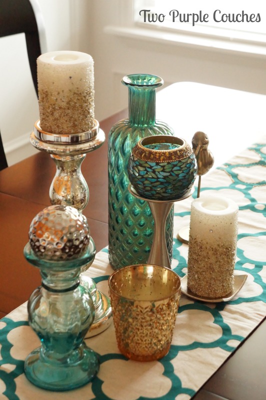 Pretty mix of teal and gold table centerpiece. via www.twopurplecouches.com #homedecor #diningroom #orange #teal #color