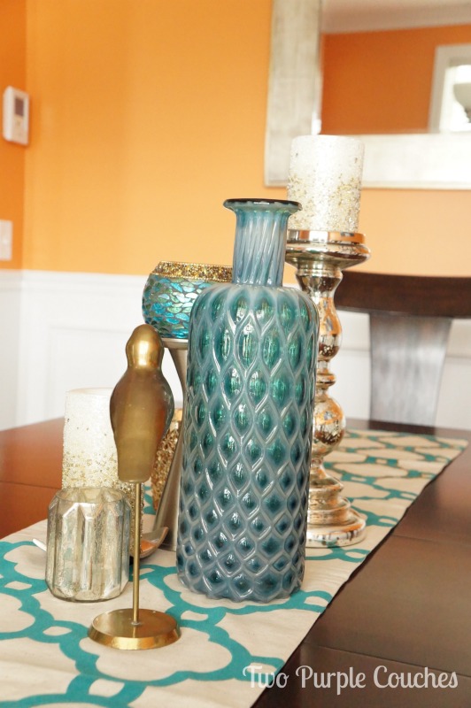 Bold dining room color palette: orange & teal. via www.twopurplecouches.com #homedecor #diningroom #orange #teal #color