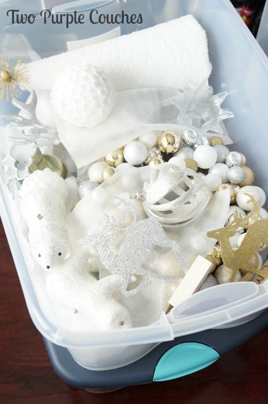 Holiday storage tip: store like-items together, like golds and silvers. via www.twopurplecouches.com