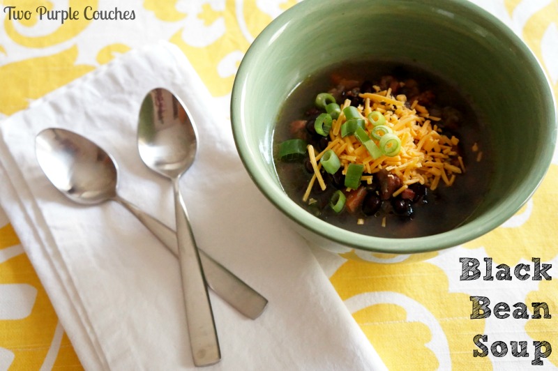 Flavorful black bean soup makes a great meal on snowy, wintry days! via www.twopurplecouches.com