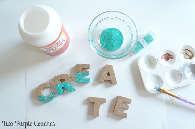 Use Mod Podge to give illusion of letters "dipped" in glitter. via www.twopurplecouches.com