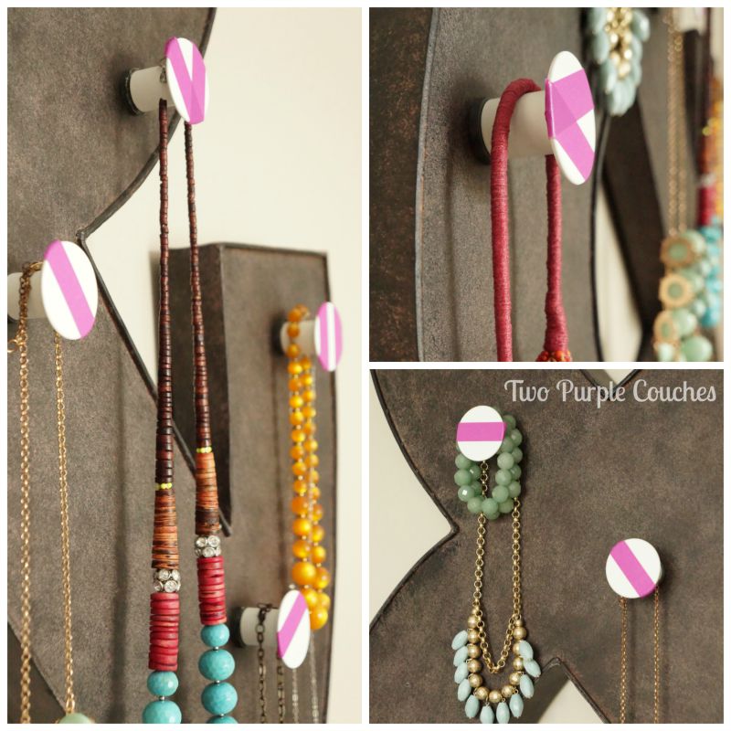 Turn metal wall decor into a functional jewelry display using metal Enudden knobs from IKEA! via www.twopurplecouches.com