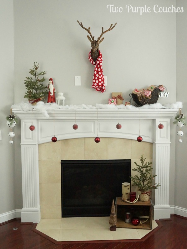 Simple, rustic style decor creates a beautiful holiday mantel. 