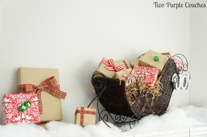 Fill a rustic sleigh full of brown paper gifts topped with pretty plaid ribbons. 