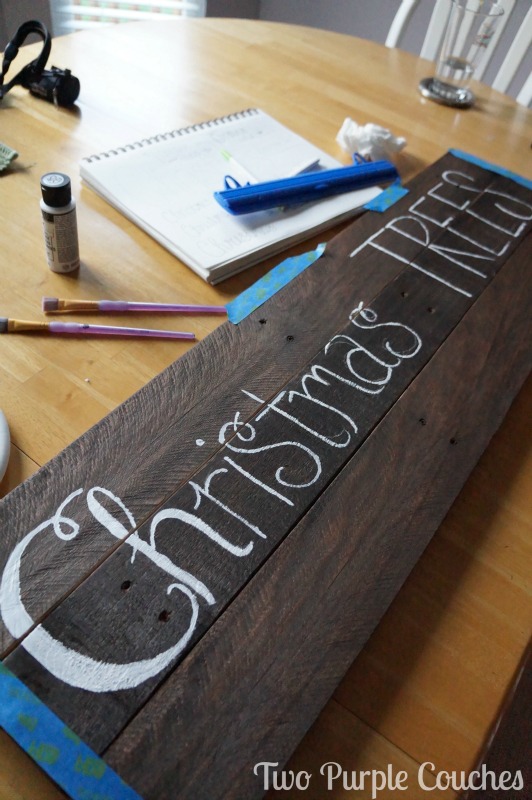 hand-lettering a pallet wood sign