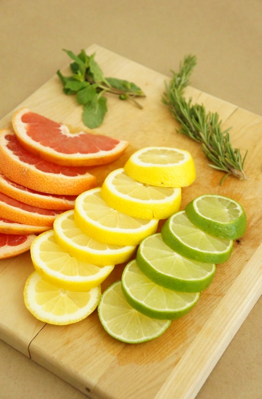 Use sliced citrus, ginger and herbs to create a medley of fresh simmering pot recipes to naturally fragrance your home for Spring