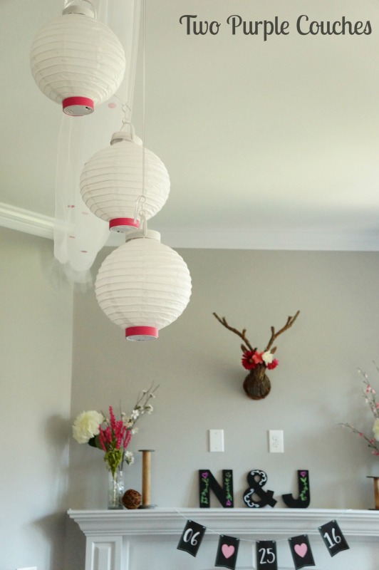 Whimsical paper lanterns and tulle - perfect accents for a pretty garden party bridal shower.