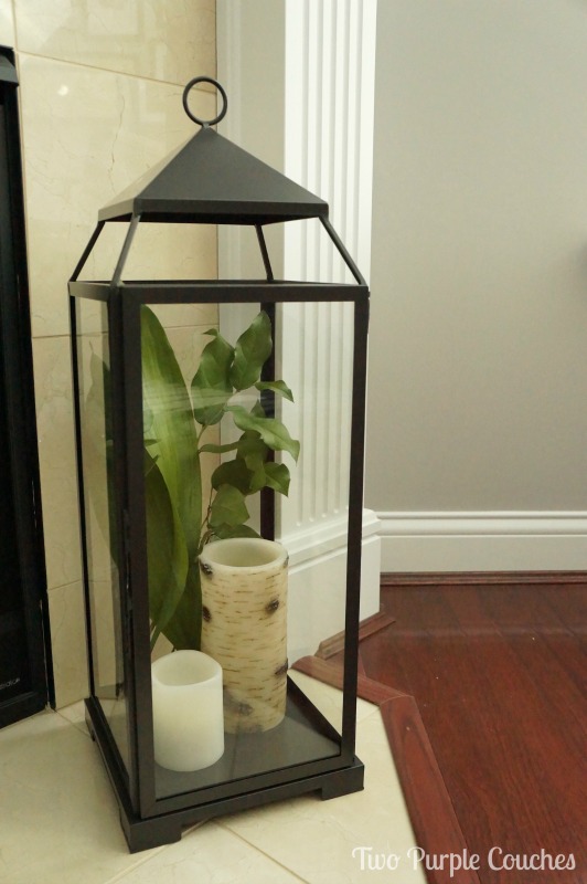 PB Malta lantern styled with candles and greenery for summer