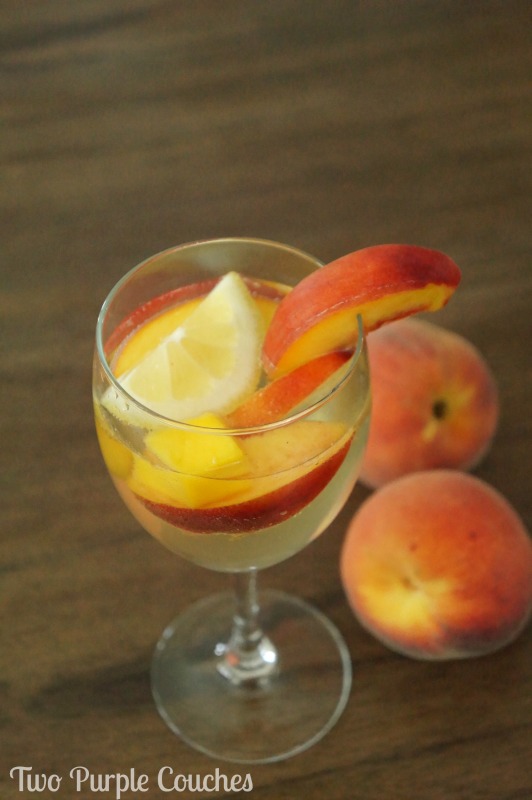 Best summer sangria recipe! This peach sangria recipe combines crisp white wine, peach schnapps and ginger simple syrup for a sweet, refreshing spritzer.