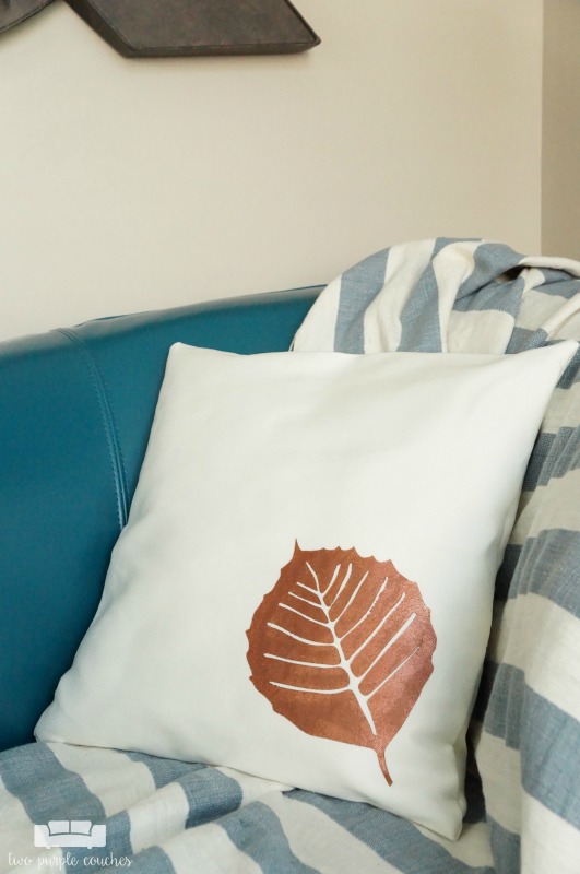 Learn how to use your cutting machine to create a stencil and create this fall leaf throw pillow! An easy way to update throw pillows for each season!