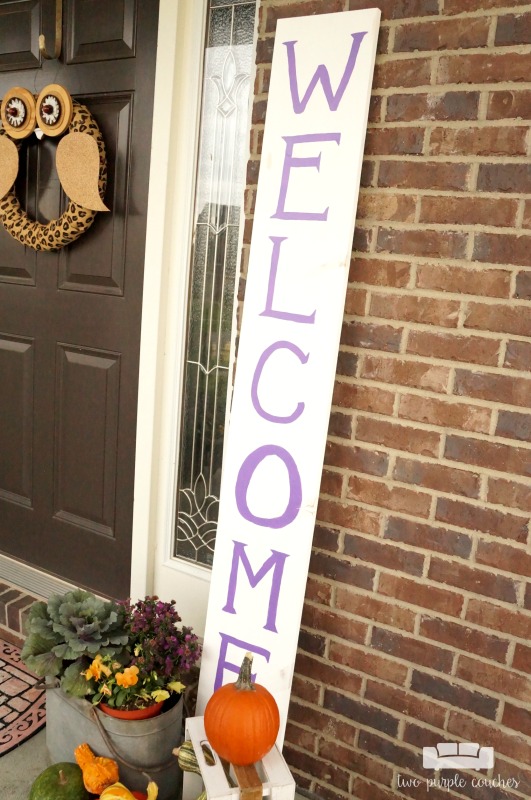 Learn how easy it is to make your own large porch sign and create a warm welcome for guests. Love how this looks and it's so easy to customize!