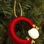 These adorable mason jar ring wreath ornaments are perfect for holiday decorating and gifting! Plus check out 21 other handmade ornament ideas!