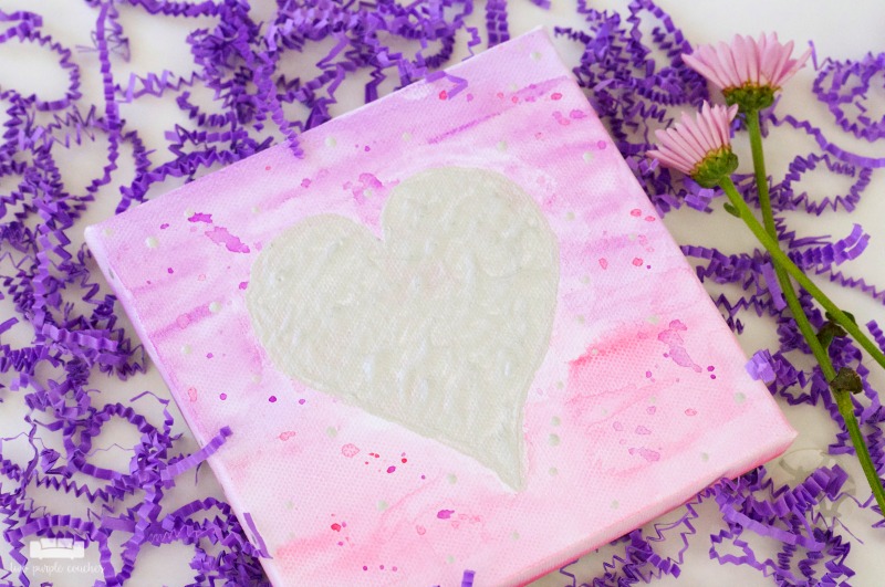 Valentine's Day Canvas Art / Easy DIY Valentine's art idea with watercolors, metallic paint and an inexpensive art canvas from the craft store. 