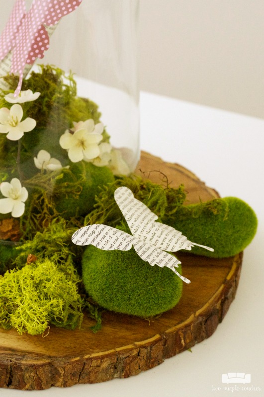 Create a beautiful centerpiece for your home with this simple spring butterfly cloche decor idea. Just add flowers, moss and butterflies! 