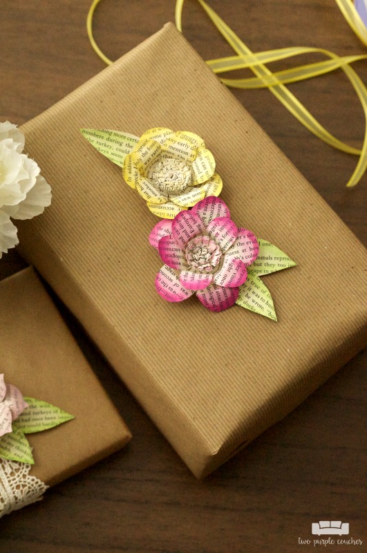 Make your gifts extra special with these DIY book page flower gift toppers - perfect for bridal shower gifts, Mother's Day gifts, and birthday gifts!
