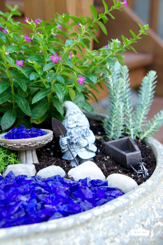 Learn how easy it is to make a fairy garden in a pot. Simple outdoor plants and accessories bring your DIY gnome or fairy garden container ideas to life!