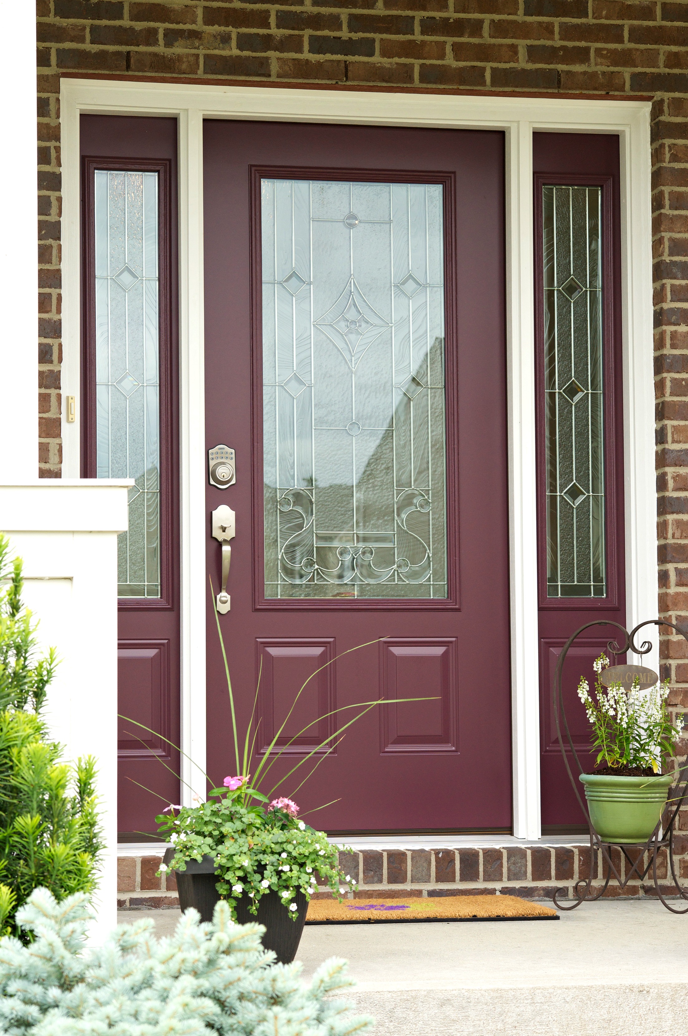 Wow! You've got to see this before and after! This new decorative glass front door adds so much style and curb appeal to this home! 