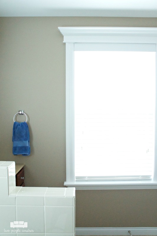 Love how they've added custom trim and moulding to their bathroom windows!