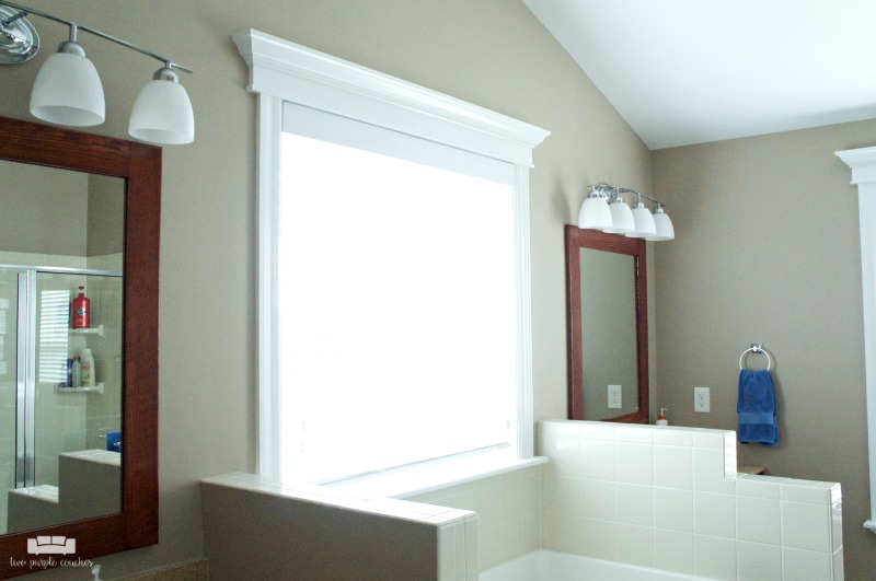 Master Bath with double vanity. Custom framed window above garden soaking tub.