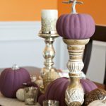 Fall table decor goes sophisticated with these simple ideas. Dress up a modern neutral runner, add candles and pumpkins to create a pretty tablescape.