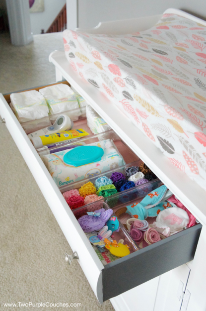 Repurpose a vintage piece of furniture into a cute & functional changing table for your nursery.