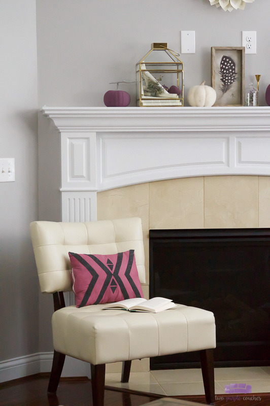 Autumn Mantel Decorating Idea with purples, creamy neutrals and brass accents