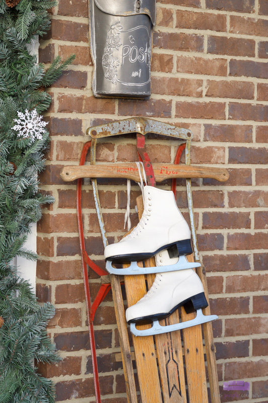 Christmas Front Porch Decor with Vintage Sled and Ice Skates