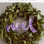 Noel sign created with DIY acrylic paint pouring technique turns a wooden sign into a unique and beautiful modern Christmas decoration!