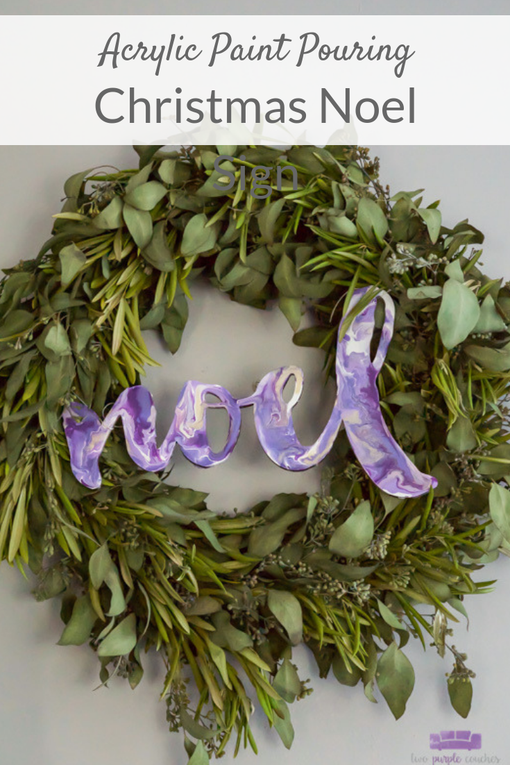 Noel sign created with DIY acrylic paint pouring technique turns a wooden sign into a unique and beautiful modern Christmas decoration!