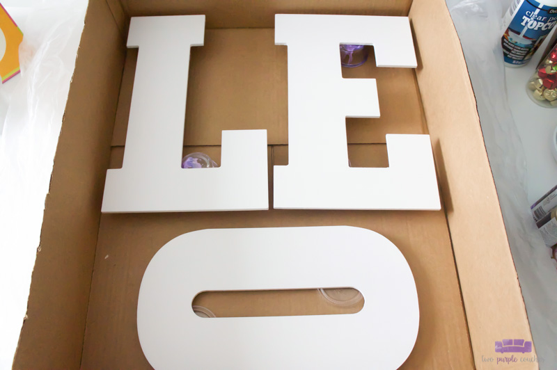 wooden letters prepped for paint pour