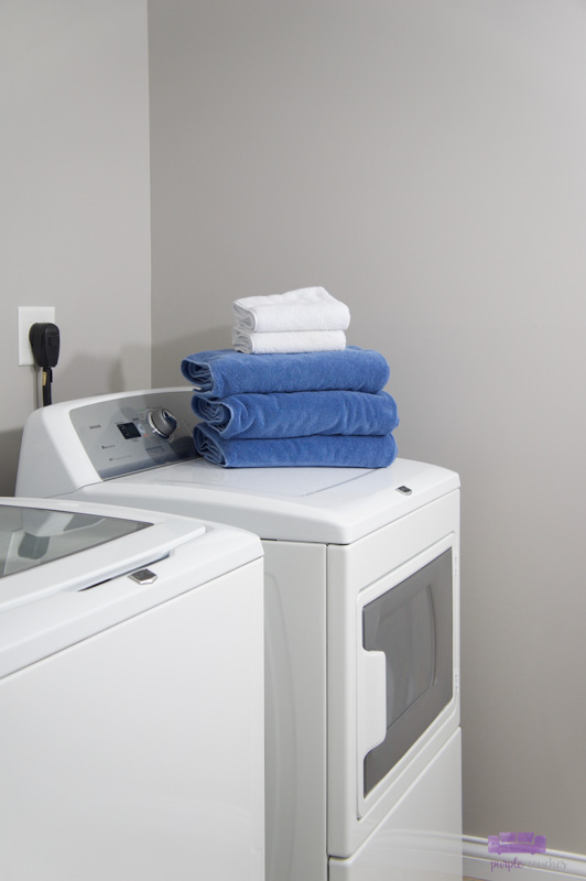 The Easiest Way to Paint a Laundry Room - two purple couches