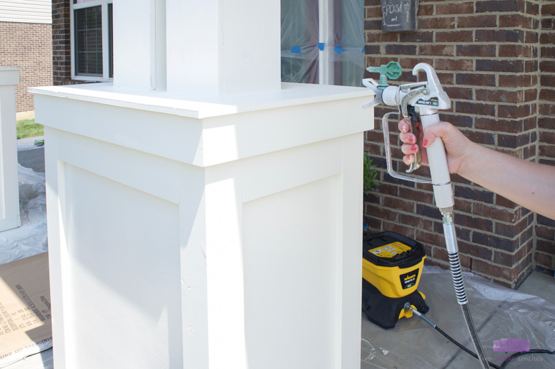 painting porch column with sprayer