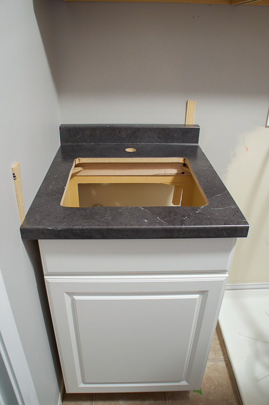cabinet in place for laundry sink